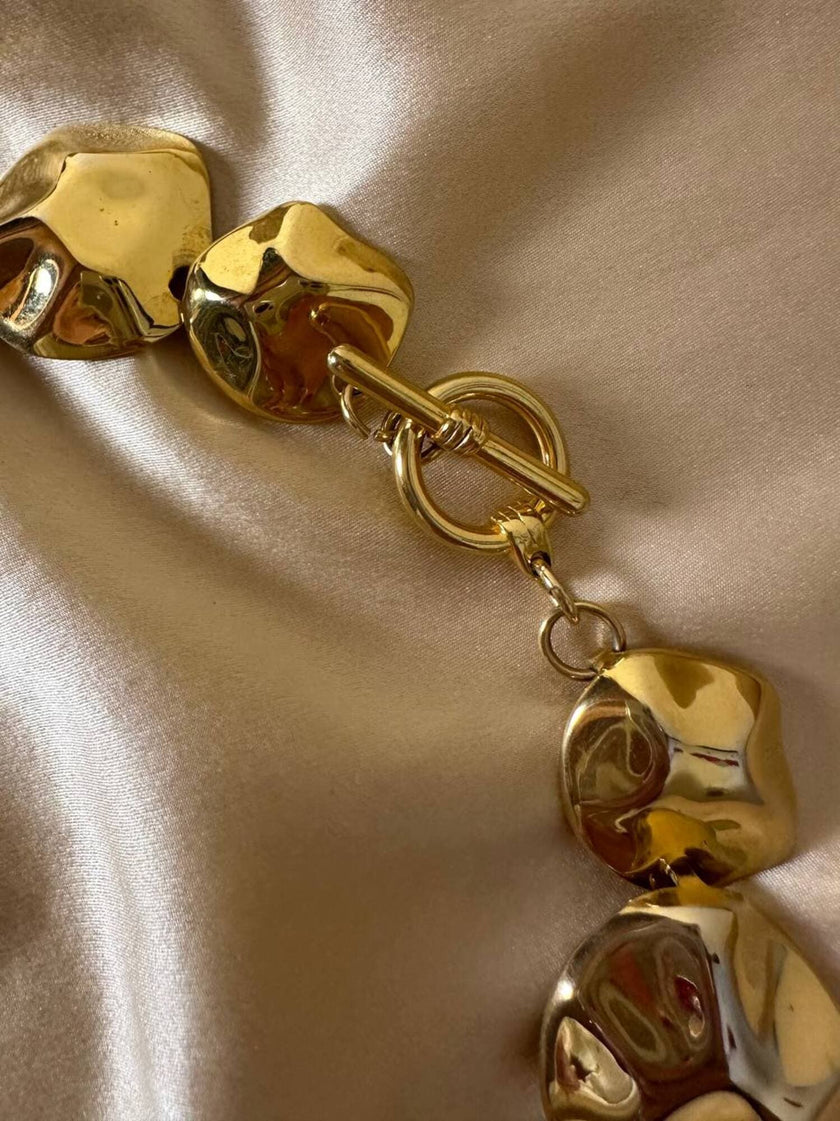 Collier dorato a pepite