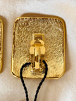 Maxi clip oro con logo “Yves Saint Laurent”