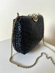 Borsa vintage Rodo in midollino nero con tracolla a catena oro