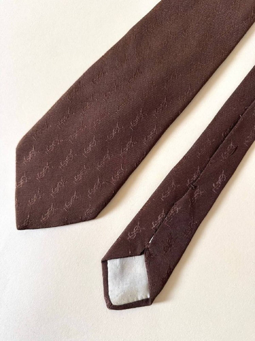 Cravatta Yves Saint Laurent in seta jacquard marrone con logo YSL allover