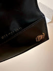 Portachiavi trifold Gucci in pelle nera con logo in metallo oro e scatola originale
