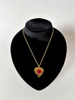 Collier vintage Yves Saint Laurent con ciondolo a forma di cuore firmato e cabochon rosso