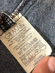 Giacca Christian Lacroix in denim modello sciancrato con lavorazione a nervature