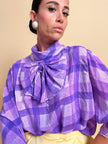Blusa in seta lilla con maxi fiocco