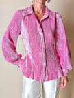 Camicia rosa in tessuto micro plissé con bottoni in madreperla “Ganni”