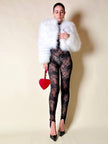 Jumpsuit con staffe in pizzo nero “La Perla”