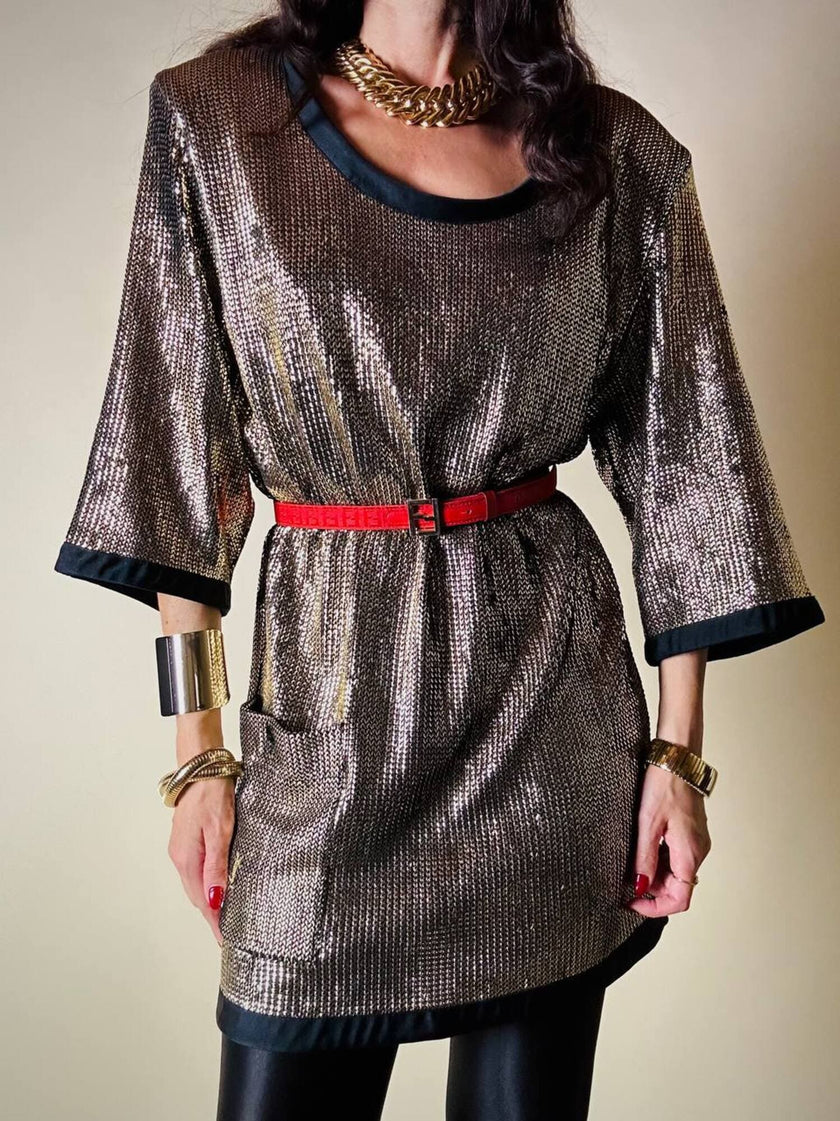 Mini dress oro in tessuto operato con profili neri in raso nero  “Yves Saint Laurent”