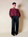 Blusa in seta nera con bocche e cuori rossi “Yves Saint Laurent”