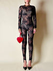 Jumpsuit con staffe in pizzo nero “La Perla”