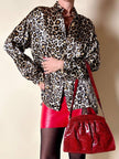 Pochette in whips rossa con tracolla regolabile