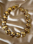 Collier dorato a pepite