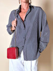 Borsa vintage Sgargi forma ottagonale in lizard rossa con tracolla in catena