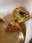 Maxi clip oro con cuori pendenti “Moschino”