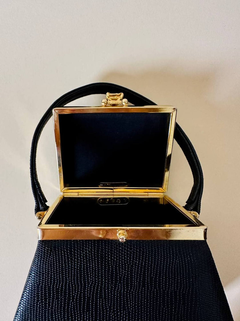 Mini bag a trapezio in ecopelle nera stampa lizard