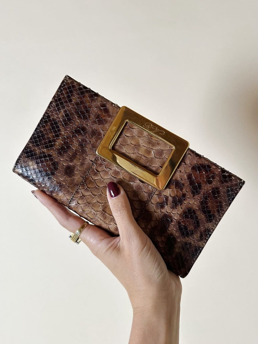 Vintage Roger Vivier leopard-print python clutch with a distinctive rectangular gold-tone metal clasp