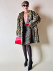 Eco pelliccia leopardata con maxi bottoni neri