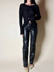 Maglia vintage Yves Saint Laurent nera traforata con profili smerlati