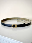 Cintura vintage Yves Saint Laurent in pelle nera con fibbia geometrica oro con logo YSL