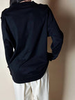 Maglia vintage Yves Saint Laurent in cotone nero con firma ricamata e bottoni dorati