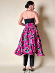 Gonna a ruota in seta fantasia floreale fucsia con maxi fiocco