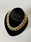 Collier vintage oro con elementi geometrici striati