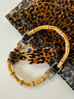 Clever Carriage Co. Tote-Bag aus leopardenmuster-PVC mit Griffen aus echtem Bambus