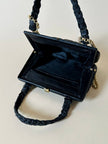 Mini bag in tessuto intrecciato con riporti in pelle