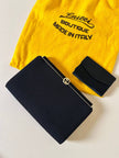 Mini pochette in tessuto nero con chiusura logata color oro “Gucci”