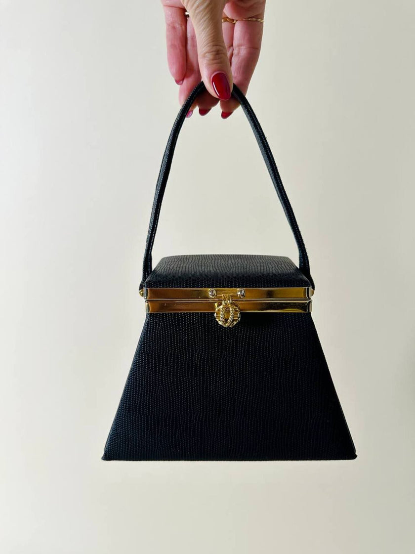 Mini bag a trapezio in ecopelle nera stampa lizard