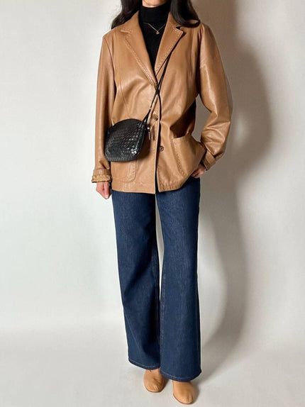 Giacca vintage in pelle color cuoio con impunture a mano Claude Collections
