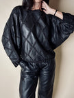 Blusa vintage in pelle nera patchwork con lavorazione crochet e maniche a pipistrello