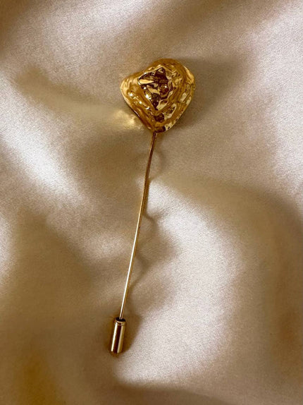 Spillone dorato con pepita “Yves Saint Laurent”