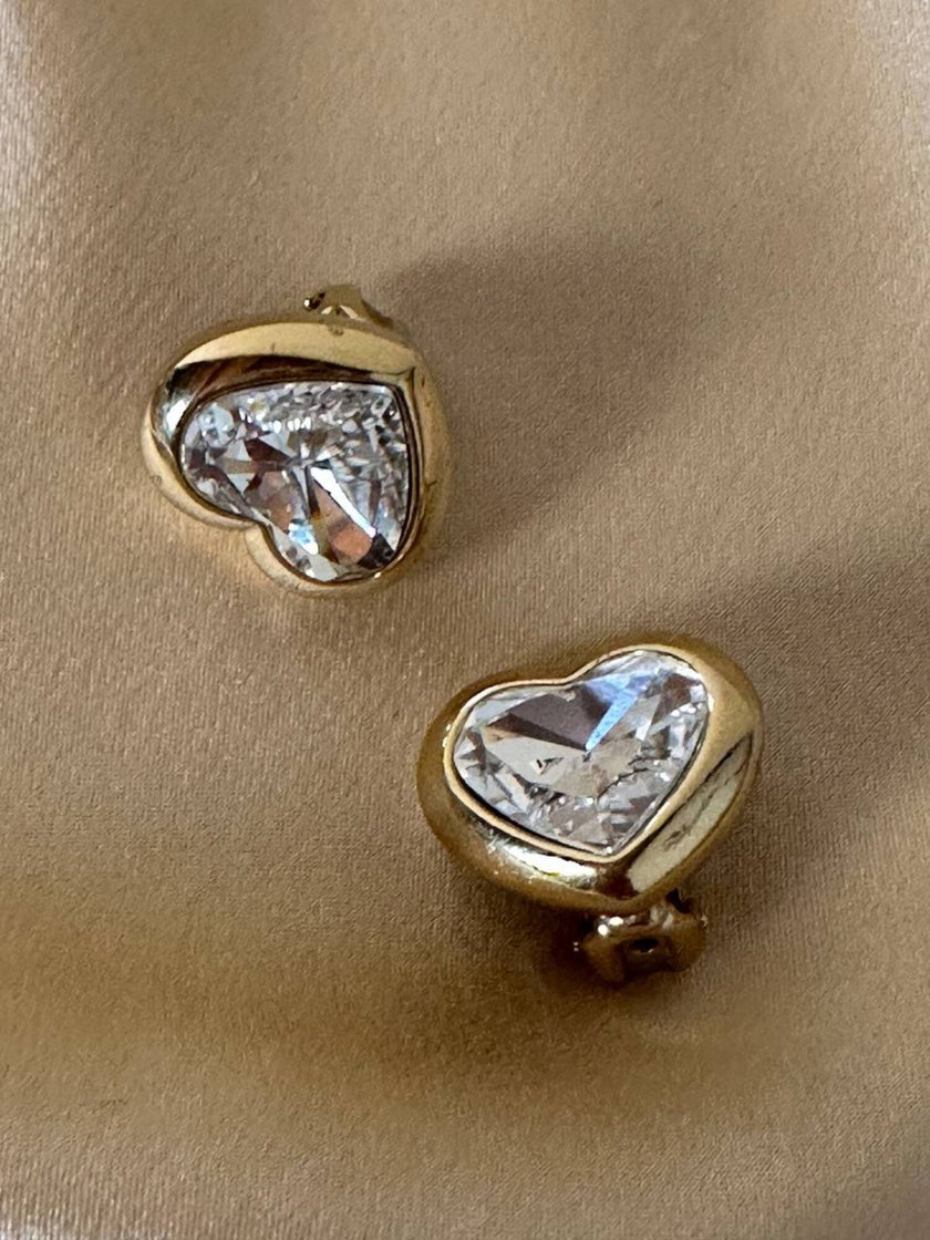 Clip dorate a forma di cuore con strass centrale