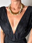 Collier vintage oro con elementi geometrici striati