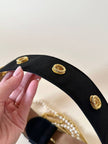 Cintura alta in gros grain nero con perle e catene pendenti “Moschino”