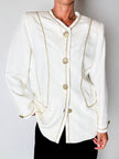 Giacca vintage Yves Saint Laurent bianco latte con serpentine dorate e bottoni gioiello