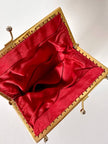 Borsetta vintage di perline rosse con frangia sul fondo