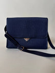 Borsa messenger in tessuto plastificato e pelle blu “Yves Saint Laurent”