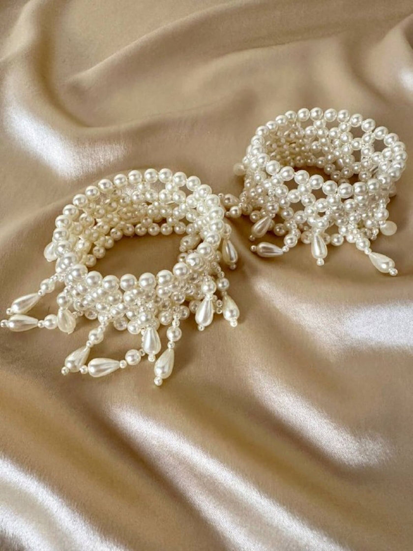 Polsiere elasticizzate di perle sintetiche