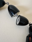 Collana multifilo in lucite Angela Caputi Giuggiù con moduli baguette sfaccettati neri e corallo