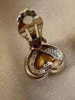 Clip dorate a forma di cuore con strass centrale