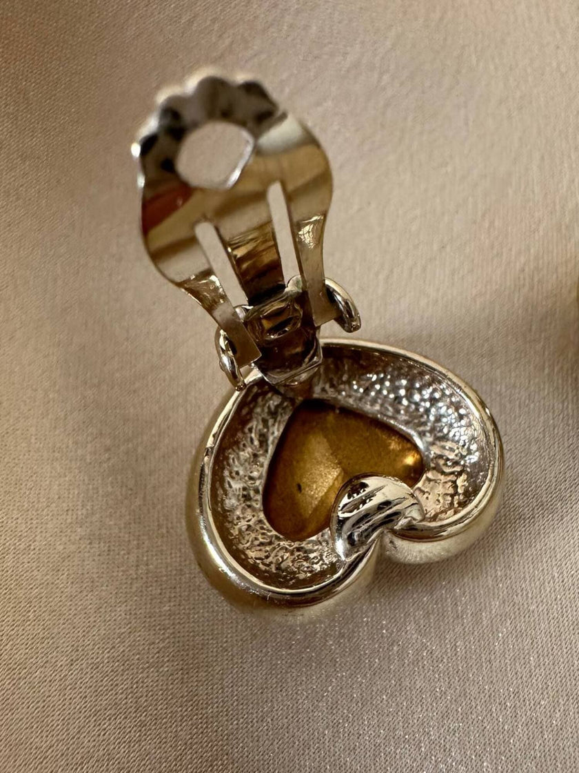 Clip dorate a forma di cuore con strass centrale