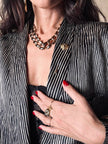 Spillone dorato con pepita “Yves Saint Laurent”