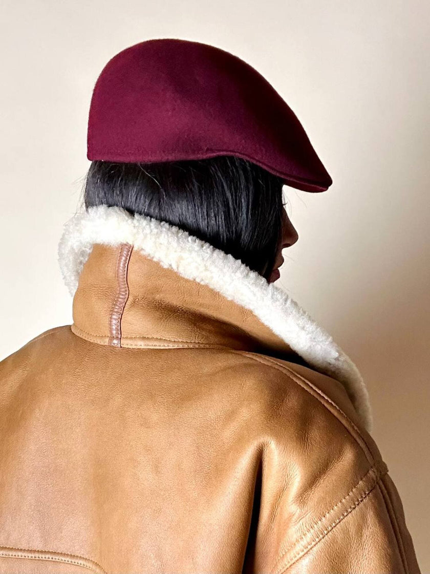 Coppola in feltro di lana bordeaux con rifinitura in pelle cuoio Fellini Roma