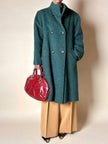 Cappotto doppiopetto in lana bouclé verde bosco con fodera firmata