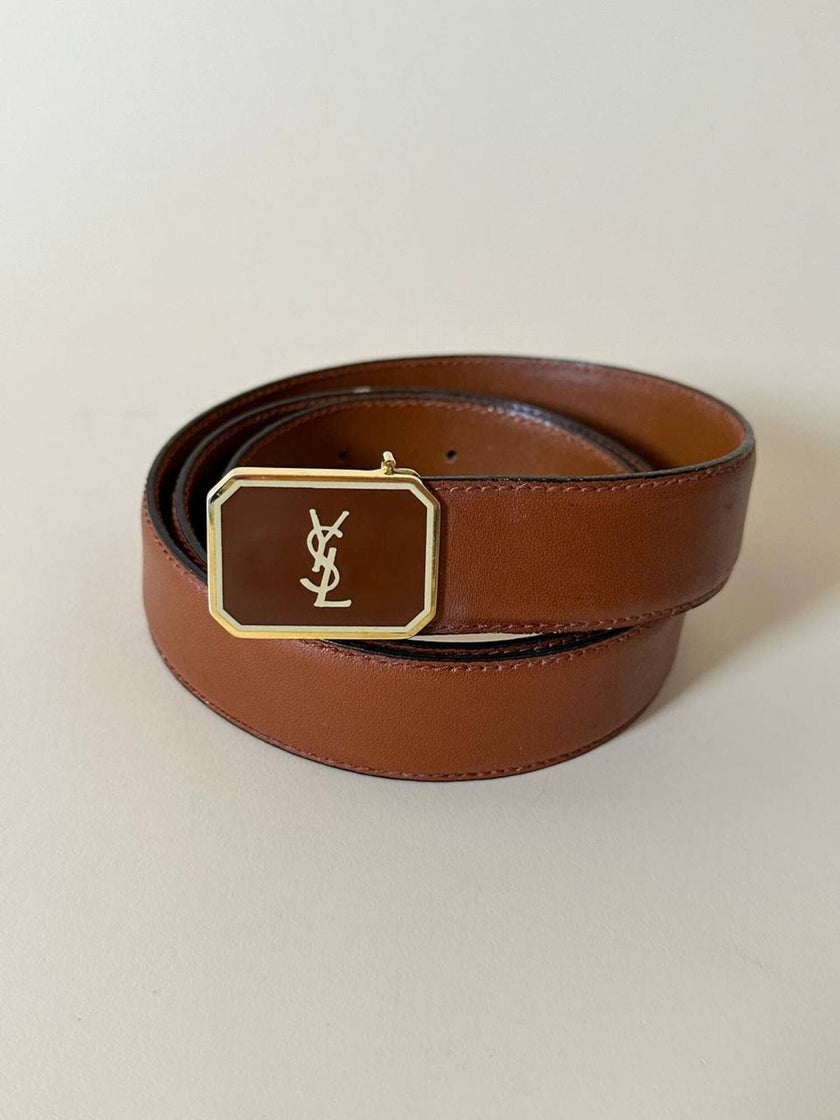 Vintage Yves Saint Laurent tan leather belt with an octagonal enamel buckle and YSL logo