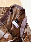 Collant Yves Saint Laurent in lycra fantasia pitone nei toni del beige bronzo e marrone