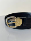 Cintura vintage Yves Saint Laurent in pelle nera con fibbia oro