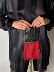Borsetta vintage di perline rosse con frangia sul fondo