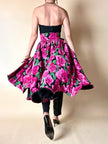 Gonna a ruota in seta fantasia floreale fucsia con maxi fiocco